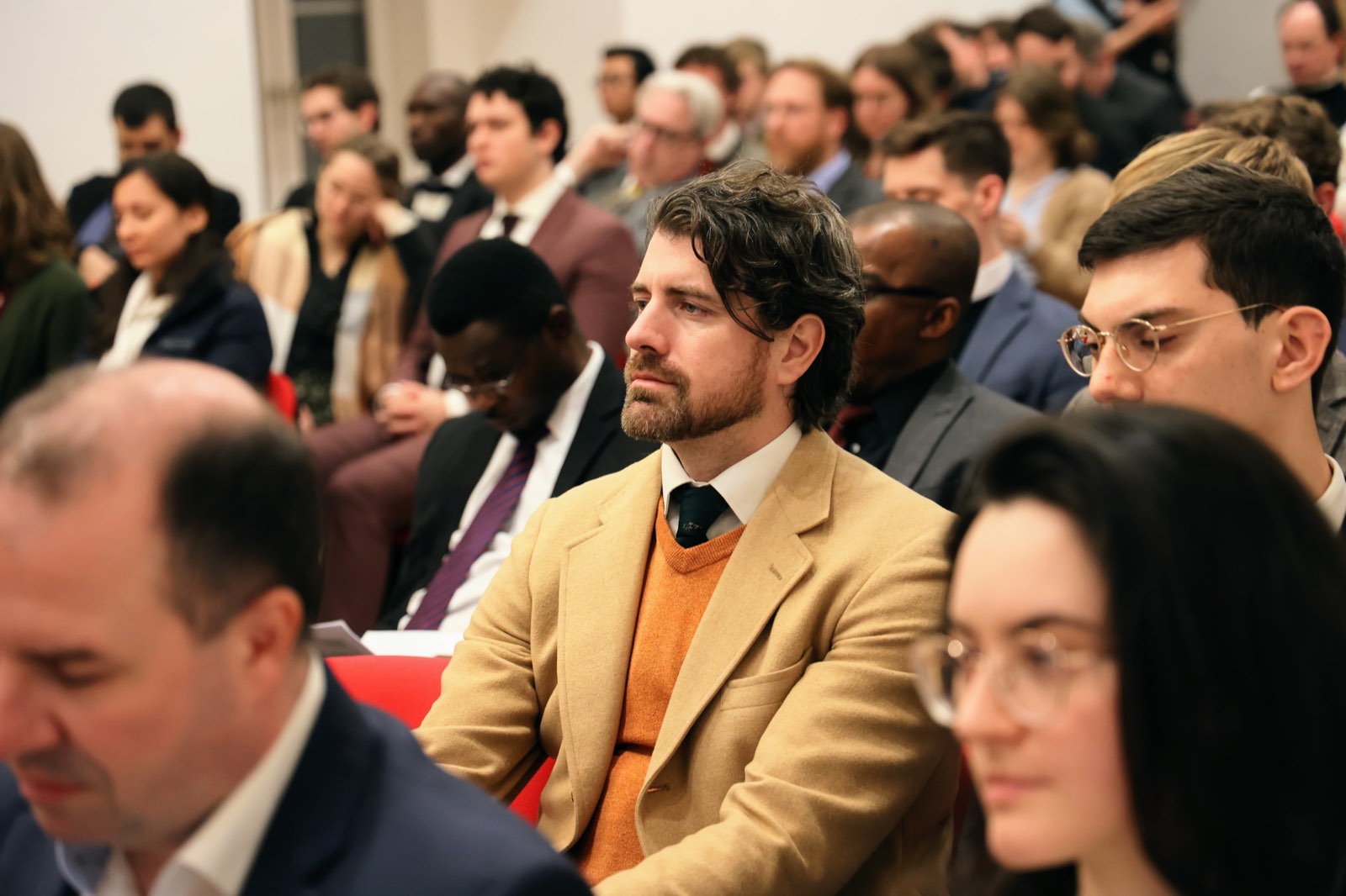 Attentive audience at a theological lecture